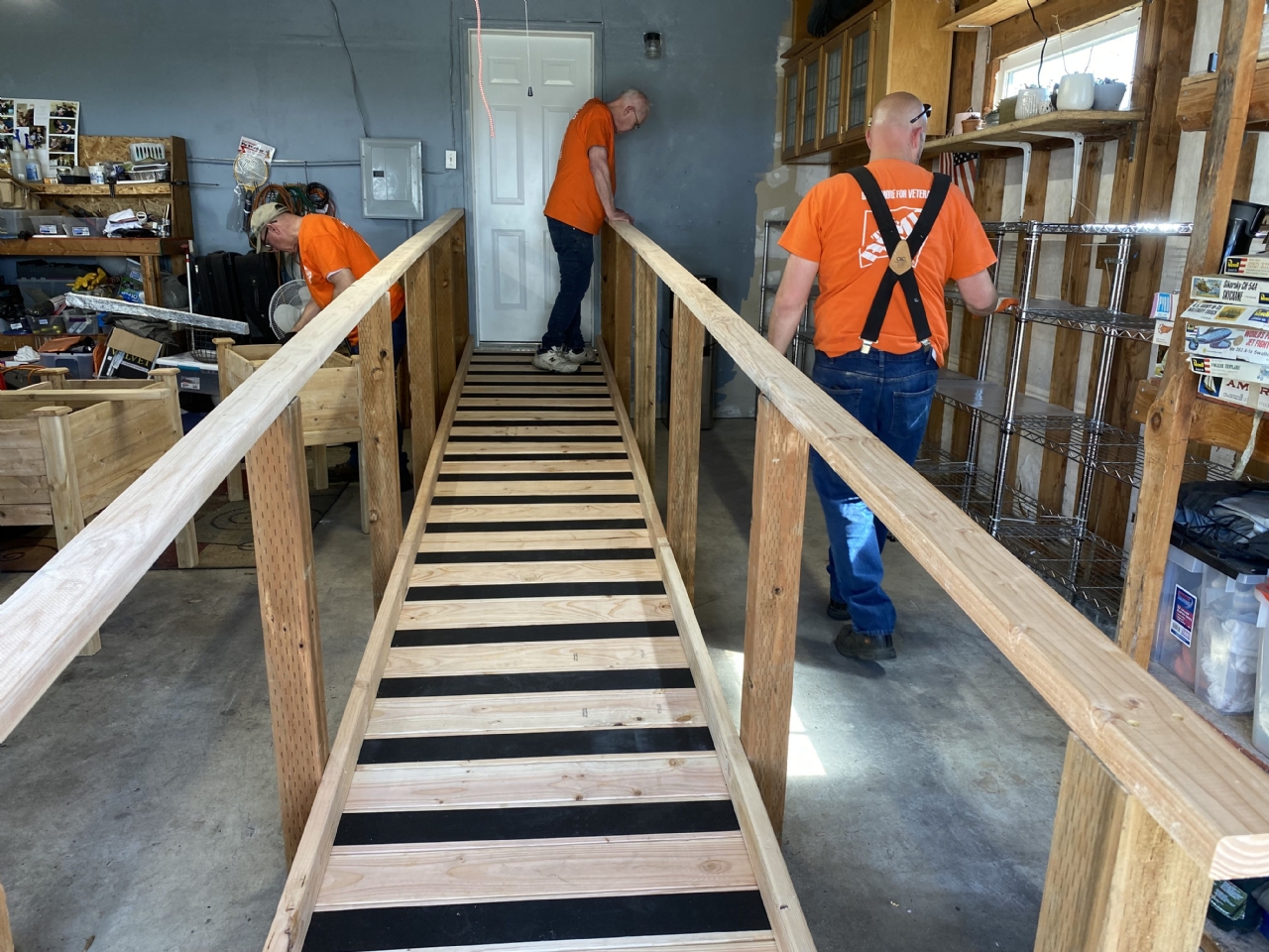 Home Depot partners with VFW post 10580 to build ramp for local Veteran.